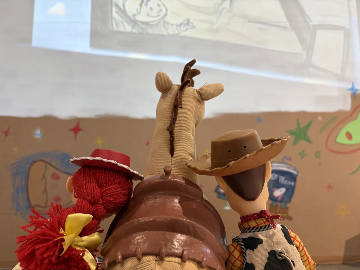 Bullseye, Jessie and Woody watching the screen